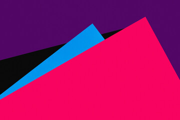 simple pink, purple, blue and black background with copy space.