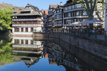 Strasbourg, France - May 22, 2017: Tanners’ House and timbered houses along the ILL canal, Petite France District, Strasbourg, Alsace, Bas-Rhin Department, France