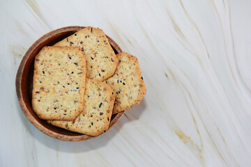 dietary dry crackers with cumin and quinoa seeds