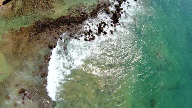 Aerial tilt down and up of cinematic coastal landscape, Mirissa, Sri Lanka