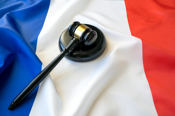 Judicial gavel on Flag of France, concept picture