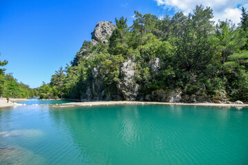 Goynuk canyon in Antalia, Turkey with turquoise river water and mountains. 