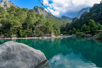 Goynuk canyon in Antalia, Turkey with turquoise river water and mountains. 