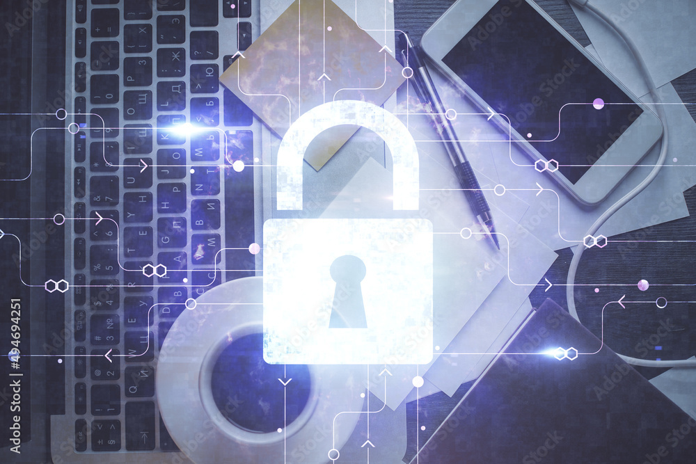 Poster Double exposure of lock hologram drawing over study table background with computer. Concept of data security. Top view.