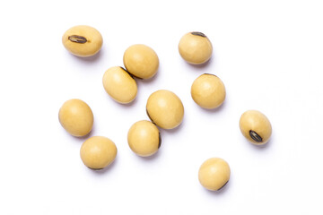 Group of soybeans isolated on white background. Top view. Flat lay. Macro.