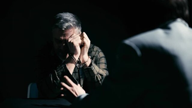 Arrested man refusing to testify or cooperate with police, crime investigation