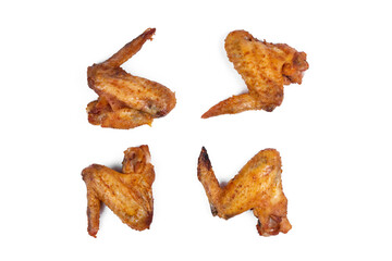Fresh roasted chicken wing quarters on white isolated background