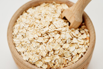 Оatmeal in bowls and bags isolated on a white background. High quality photo