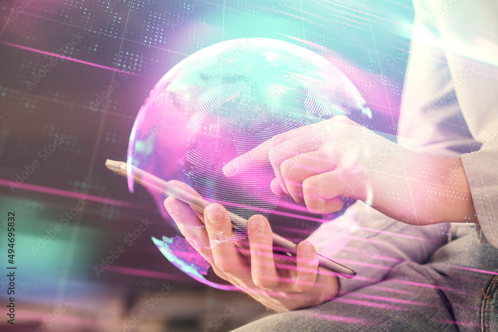 Aufkleber Double exposure of man's hands holding and using a digital device and tech theme hologram drawing. Technology concept.