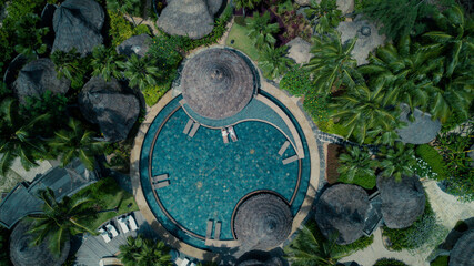 Couple on sun beds in the tropical paradise of Seychelles, Aerial view