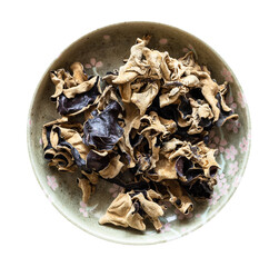 dried chinese wood ear fungus in bowl isolated