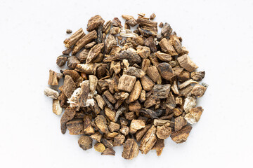 top view of pile of chopped dried burdock roots - obrazy, fototapety, plakaty