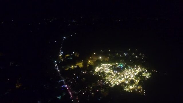 A drone view of night market in Goa, India.