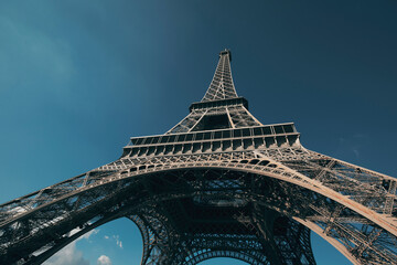 eiffel tower detail with blue sky backgrounf