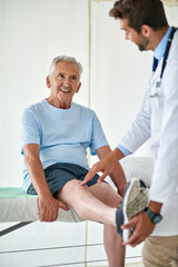 His check ups are always fun with his friendly doctor. Cropped shot of a happy senior man attending...