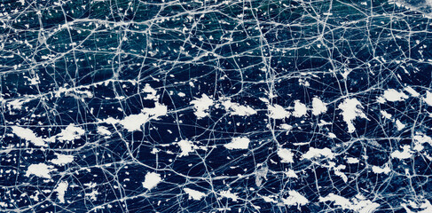 Banner abstract background texture of blue ice with cracks, aerial top view of Lake Baikal