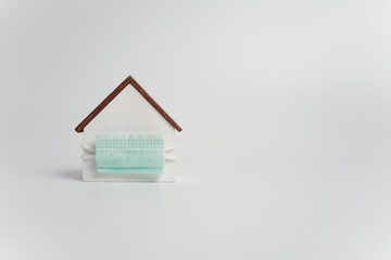 Home wearing protective face mask during pandemic. Concept of health protection, healthcare for...