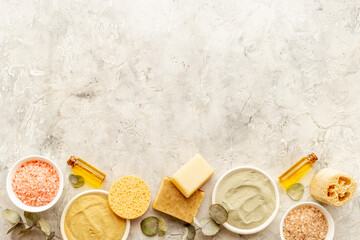 Spa cosmetic products with shower sponge and pumice. Top view flatlay