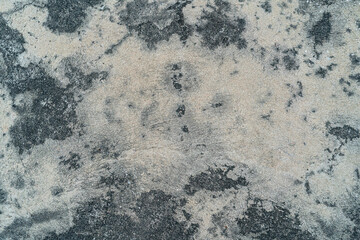 Grey Abstract old dirty dark cement wall background on ground texture.