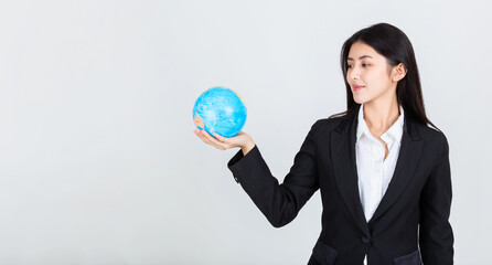 Portrait of young asian business woman hand hold earth global, global business concept.