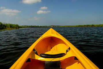 Yellow canoe on the lake, Poland