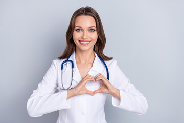 Photo of young lovely woman show fingers heart symbol romance cupid isolated over grey color background