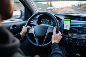 Navigation auto map system. Global positioning system on smartphone screen in auto car on travel...