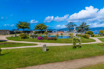 A view across the gardens at the upper levels of the Castro castle in Vigo, Spain on a spring day