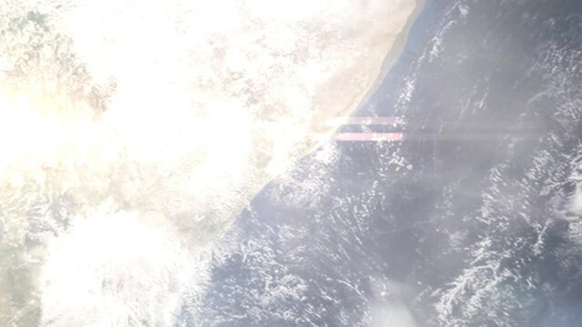 Earth zoom in from outer space to city. Zooming on Marka, Somalia. The animation continues by zoom out through clouds and atmosphere into space. Images from NASA
