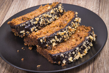 Pieces of zucchini dough with nuts and raisins. Delicious dessert