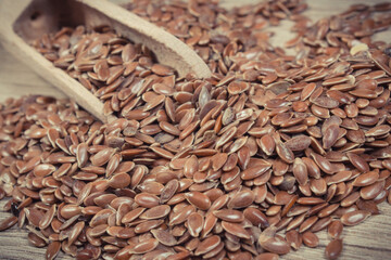 Linseed with spoon containing dietary fiber and minerals. Nutritious eating
