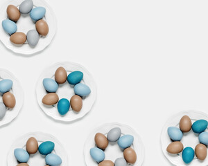 Dyed Easter eggs pastel colors blue, gray, beige on round white plate as pattern. Happy Easter holiday concept, celebration food, decorated chicken egg, neutral trendy colors.