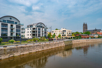 View over new modern houses at historical downtown in Magdeburg at Elbe river bank, Germany, at...