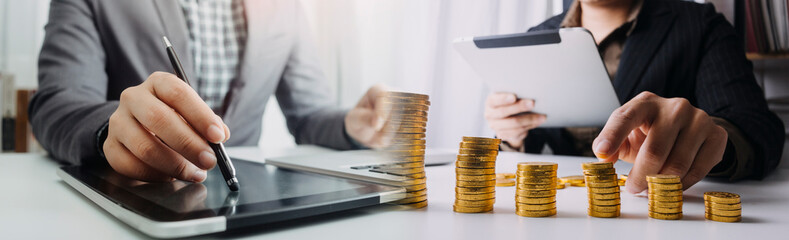 Saving money concept preset by Male hand putting money coin stack growing business