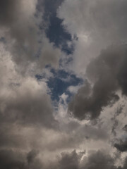 Fototapeta na wymiar rainy clouds and dark sky background