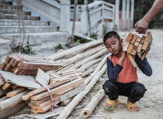 Children are forced to work in construction areas. Human rights concepts, December 10 Stop child...