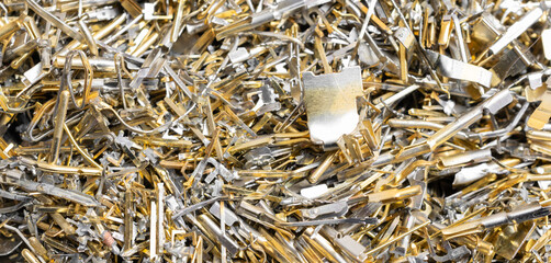 industrial gold waste from electronic components. background
