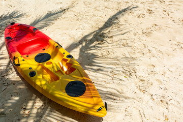 Colorful Kayak on sandy beach  , Relaxing by the Sea concepts.
