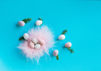 Fototapeta na wymiar Easter colored eggs on a trendy blue background. Minimal concept. Card with copy space for text. 