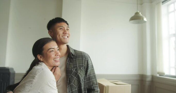 Adult Couple Embracing and Looking at New Home, Togetherness, Excitement, Home Finances