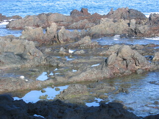 Beautiful image of the Canarian coast with a magnificent breakwater