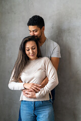 Portrait of happy multiethnic couple enjoying romantic moments together.