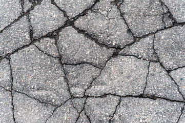 Old crack asphalt road. Textured Background