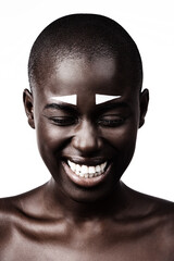 Beauty is found in the simplest form. Shot of a beautiful woman smiling against a white studio background.