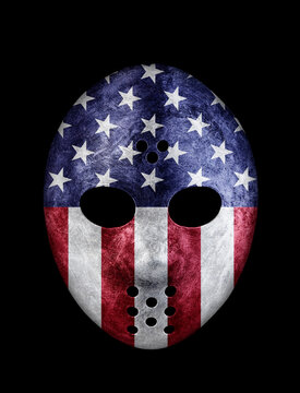 Old goalie mask with USA flag isolated on black background with clipping path