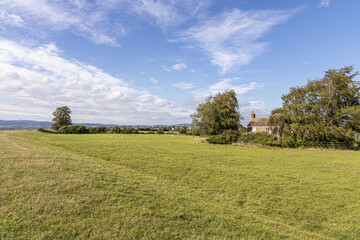 The flat Severn Vale beside the River Severn at Blue Boys Farm, Rodley, Gloucestershire, England UK