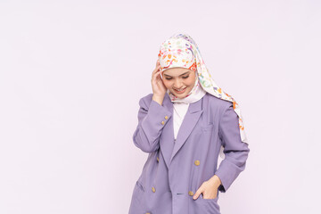 Portrait of hijab girl smiling. Pretty muslim girl. Beautiful asian muslim woman model in formal office attire posing over white background studio