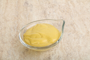 Organic mustard sauce in the bowl