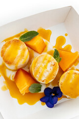 cheesecakes with fruit and sauce