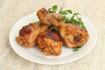 Roasted chicken leg with rucola